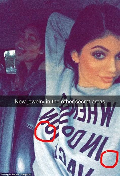 Kylie Jenner slyly exposes nipple piercings in sheer lace bra